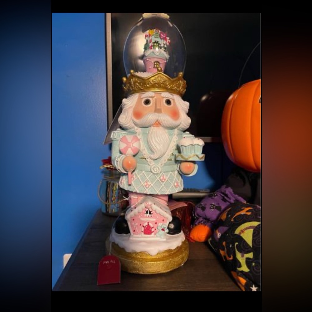 cupcake and cashmere nutcracker. The top is a snow globe